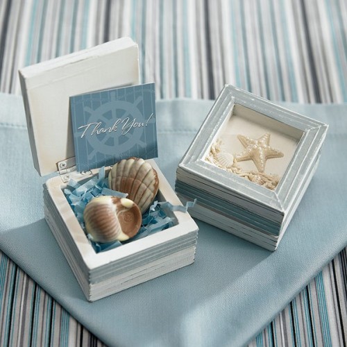 mini boxes with sea creature shaped chocolate and cards are cool beach wedding favors that will please everyone
