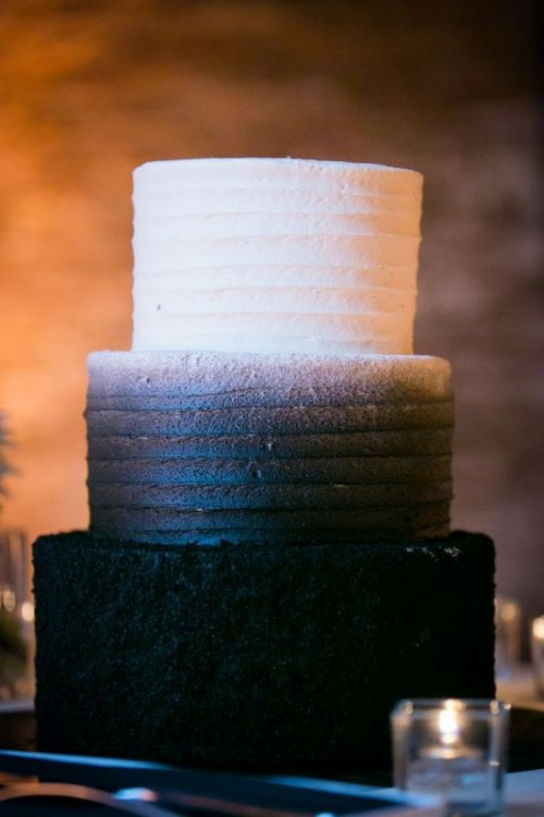 a bold ombre white to black wedding cake with a bit of pattern and texture is a beautiful idea for a modern and contrasting wedding