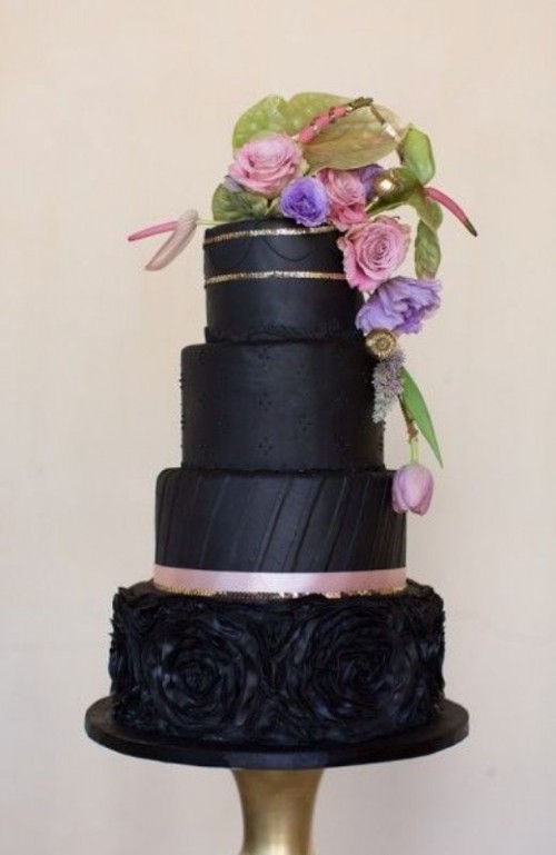 a catchy and chic black wedding cake with plain or textural tiers, gold glitter and pink ribbons, pastel blooms and greenery is a lovely idea for a dark romance and vintage-inspired wedding