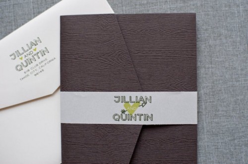 a white and wood grain envelope are great for a wedding with a woodland or rustic feel