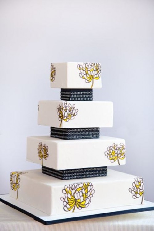 a white square wedding cake with painted yellow blooms is a stylish idea for a spring or summer wedding with a restraint color scheme