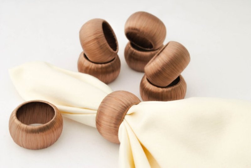 classy metallic copper napkin rings will match an elegant and chic wedding tablescape and will accent it even more