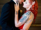 a gorgeous red wedding dress for a tattooed bride