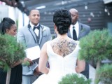 a wedding dress with a cutout back is perfect for a tattooed bride