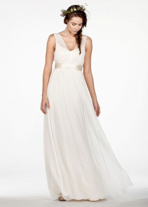 a sleeveless pleated A-line wedding dress with thick sheer straps and an embellished sash