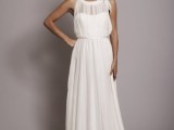 a draped A-line Grecian wedding dress with a sleeveless bodice, illusion neckline and a sash to accent the waist