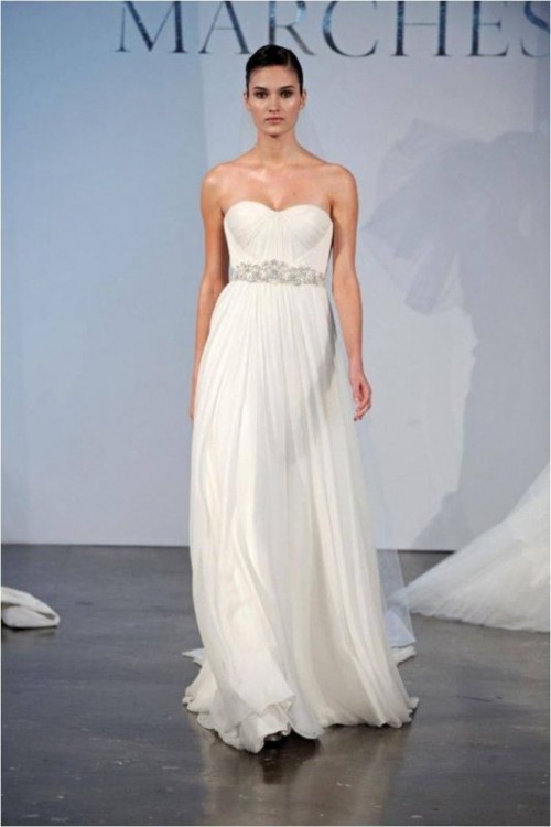 a strapless draped wedding dress with a heavily embellished wide sash for a Grecian-style bride