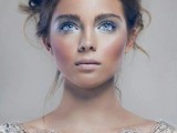 gorgeous ice blue eye shadows and a matching ice blue wedding dress for a beautiful ice queen bridal look