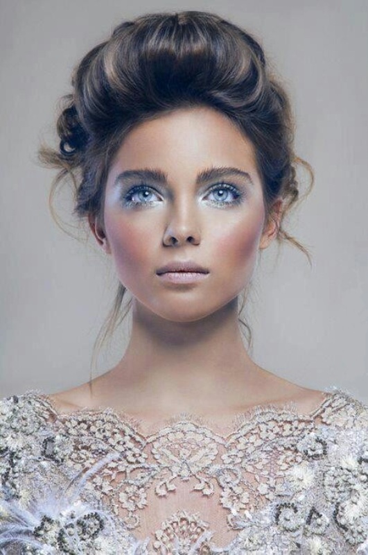 Gorgeous ice blue eye shadows and a matching ice blue wedding dress for a beautiful ice queen bridal look