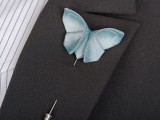 an ice blue paper butterfly boutonniere is a lovely accessory for a winter groom’s look