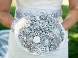 a silver and ice blue brooch wedding bouquet will be a gorgeous idea, match your embellished sash to it