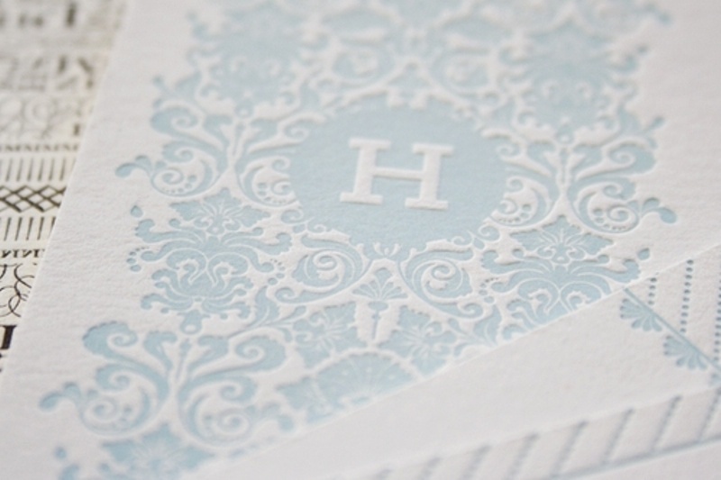 An ice blue and white printed napkin is a refined idea for your winter wedding tablescape