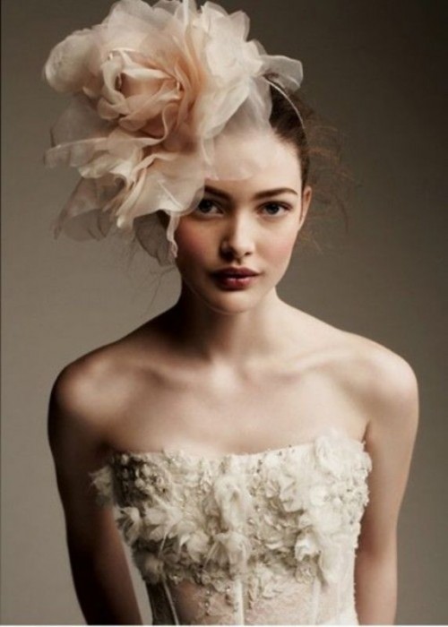 an oversized tan fabric flower headpiece is a delicate touch of color, and it will make you look outstanding, it's not a usual thing