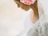 a pink and godl glitter flower headpiece plus a veil are a great and chic combo for a modern bride, it will add a delicate touch of color and interest