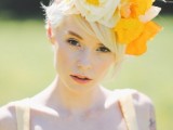 an oversized white and yellow flower crown that matches a bold yellow wedding dress and can make your look ultimate and super bold