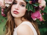 an oversized pink, dusty pink and hot pink floral crown plus greenery and berries is a gorgeous idea for a summer bride