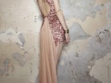 a jaw-dropping blush and rose gold sequin wedding dress with a cutout back and a train is very beautiful and romantic
