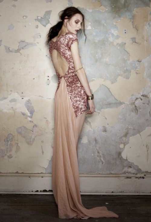 a jaw-dropping blush and rose gold sequin wedding dress with a cutout back and a train is very beautiful and romantic