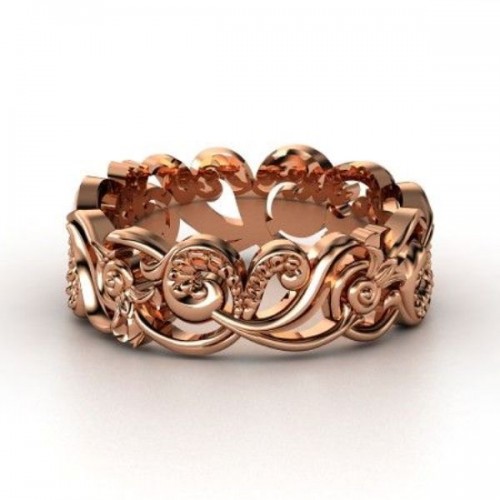 a statement rose gold patterned ring will make your wedding look wow