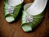 green wedding shoes accented with vintage brooches are a chic pair for a vintage wedding