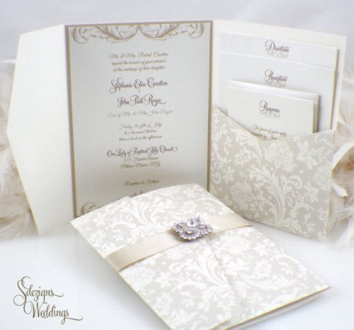 a neutral printed wedding invitation suite accented with a vintage brooch will be an ultimate solution for a vintage wedding