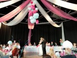 pink and white fabric ribbons and matching paper pompoms under the dome for lovely and chic decor