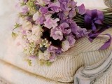 a beautiful neutral and lilac wedding bouquet with greenery is a beautiful spring or summer idea