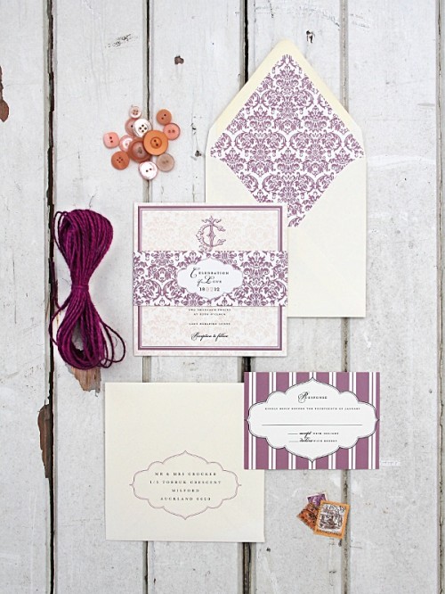 elegant lilac and white wedding stationery is a stylish idea, with stripe and floral patterns
