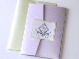 a neutral and lilac wedding invitation with an envelope is a chic and stylish idea to go
