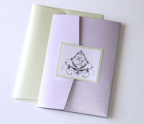 a neutral and lilac wedding invitation with an envelope is a chic and stylish idea to go
