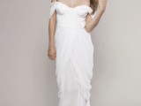 a romantic off the shoulder wedding dress with a deep neckline, a catchy draped skirt with an additional cover and a train inspired by vintage dresses