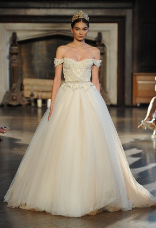 a refined off the shoulder wedding ballgown with an embellished bodice and a full tulle skirt plus a train for royal-inspired bridal look