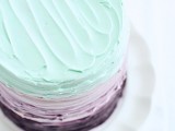a stunning textural buttercream mint and purple color block wedding cake with a mint, lavender and purple tier