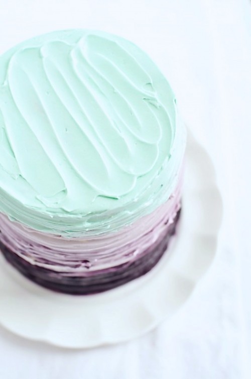 a stunning textural buttercream mint and purple color block wedding cake with a mint, lavender and purple tier