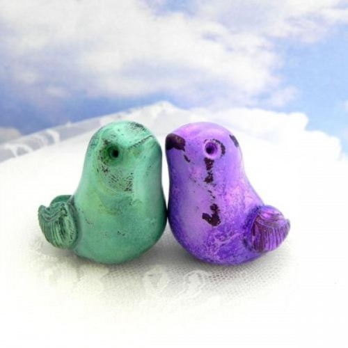 mint and purple birdie wedding cake toppers are very cute and bright and will make your wedding cake cool