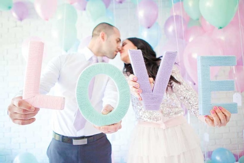 Mint, purple, pink and blue yarn wrapped letters are nice for cute pastel wedding decor