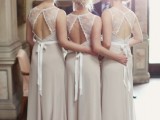 neutral sleeveless dove grey bridesmaid maxi dresses with a lace and cutout back and sashes are gorgeous and very eye-catchy