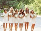 very simple matching neutral A-line mini bridesmaid dresses plus nude shoes are perfect for a relaxed spring or summer wedding