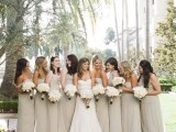 mismatching dove grey maxi bridesmaid dresses with no detailing are a very elegant and chic idea for a spring or summer wedding