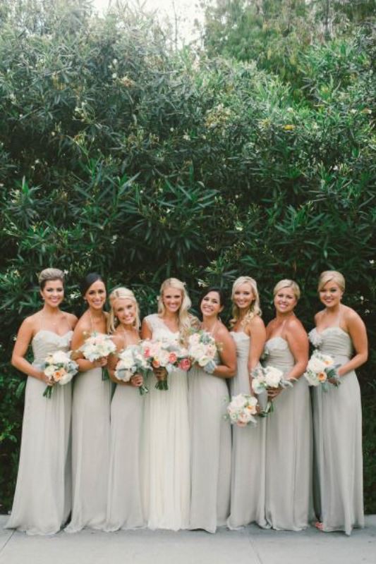 mismatching strapless and strap A line dove grey bridesmaid dresses with draped bodices are amazing for a neutral wedding