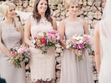 mismatching blush and neutral lace knee bridesmaid dresses with various silhouettes and necklines for a catchy bridal party look