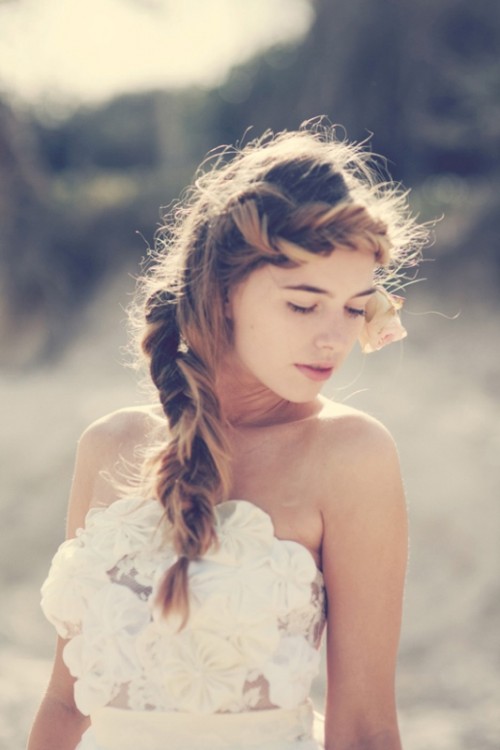 a fishtail braid covering the head partly and going down is a lovely idea for a beach wedding or some other wedding