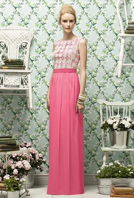 A refined bridesmaid dress with a neutral lace sleeveless bodice and a pink maxi skirt is a stylish contrasting idea