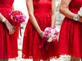 red lace bridesmaid dresses with illusion necklines and A-line silhouettes are lovely and chic for a bold spring or summer wedding