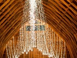 a creative wedding lights canopy going over the space is a lovely and beautiful idea to light up your space