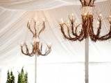 vine installations with lights and Christmas trees with lights make the space bold and cool