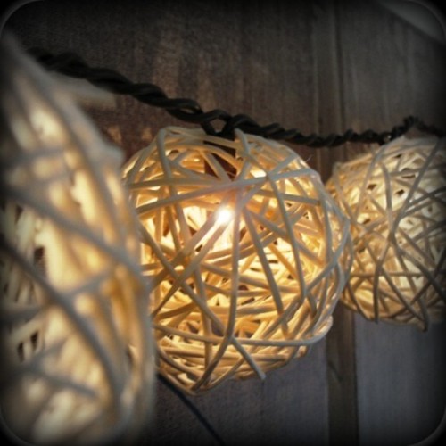 white thick yarn lights shaped as spheres are cool lights and decorations at the same time
