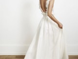 a beautiful wedding dress with a lace bodice and an A-line maxi skirt plus an open back