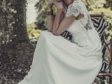 a romantic yet casual wedding dress with a lace back, cap sleeves and a plain skirt
