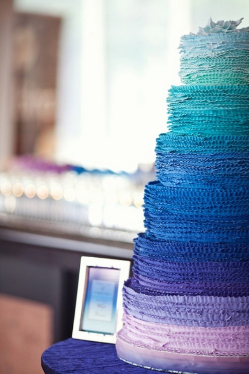 a bold gradient ruffle wedding cake from green to blue, navy and pink is a lovely idea with plenty of color for a summer wedding